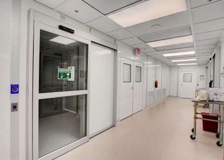 Modular Class 1000 cleanroom corridor with emergency exit, built by Allied Cleanrooms
