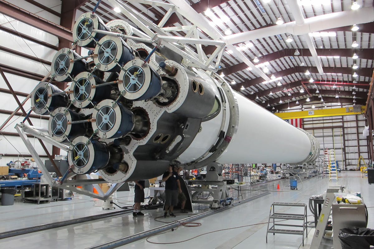 Assembly of a rocket core at an aerospace factory.