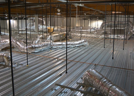 A complex HVAC duct system in a cleanroom setting, highlighting efficient air circulation and ventilation.