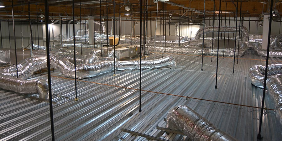 A complex HVAC duct system in a cleanroom setting, highlighting efficient air circulation and ventilation.