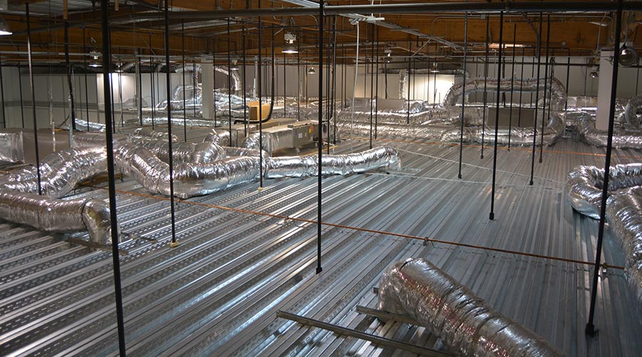 A complex HVAC duct system in a cleanroom setting, highlighting efficient air circulation and ventilation.