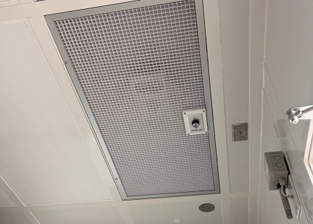 A HEPA filter installed in a grid ceiling, designed to provide clean, filtered air in a controlled environment.