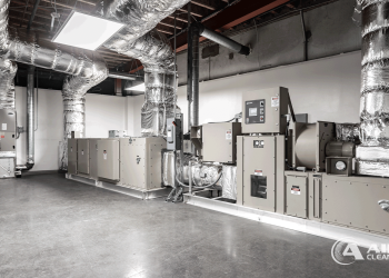 Allied Cleanrooms air handling unit system with large insulated ductwork installed in a cleanroom mechanical space