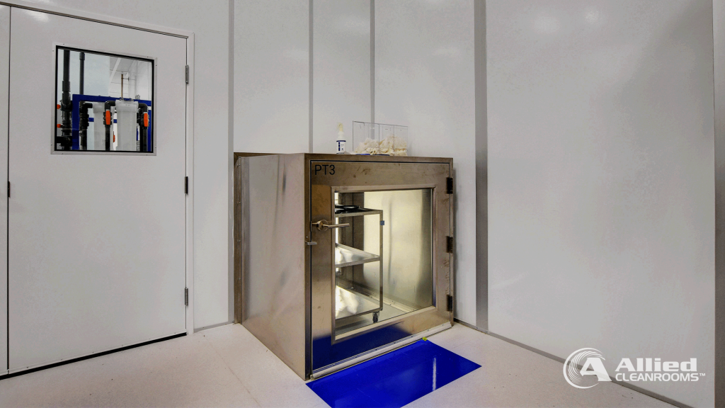 Stainless steel chamber inside a modular cleanroom built by Allied Cleanrooms.